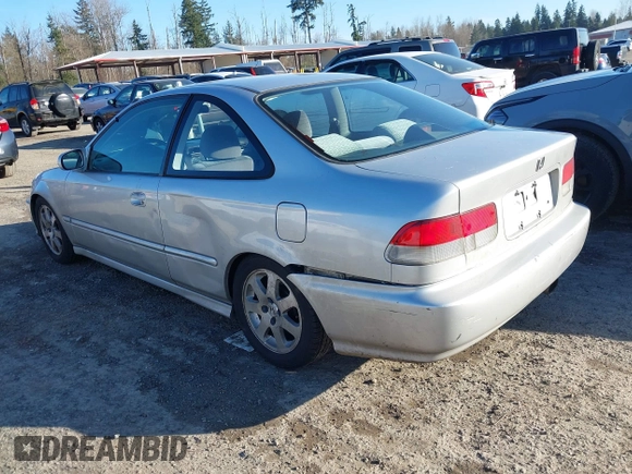 1999 Honda Civic DX with VIN 1HGEJ6120XL034343, listed as a IAAI auction lot 41691134 with 21,882 mi miles. Bid and sale history available at carsss.com. Image 3.