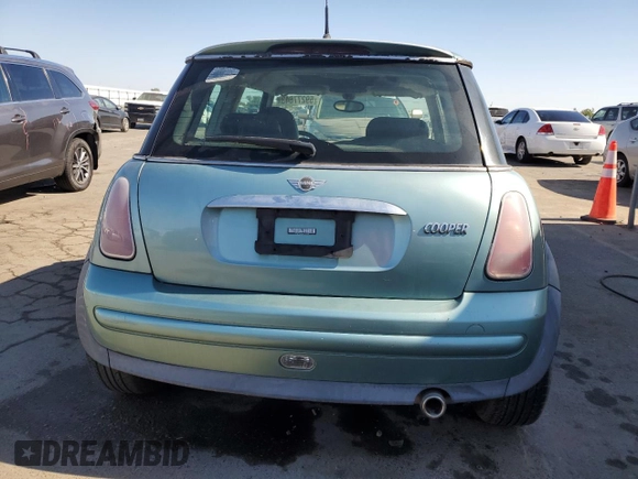 2002 MINI Hardtop with VIN WMWRC33422TE13196, listed as a Copart auction lot 59277643 with 80,501 mi miles and Non Repairable. Bid and sale history available at DreamBid. Image 6.