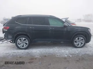2021 Volkswagen Atlas SE with VIN 1V2HR2CA9MC574558, listed as a IAAI auction lot 41296583 with 50,267 mi miles and . Bid and sale history available at DreamBid. Image 14.