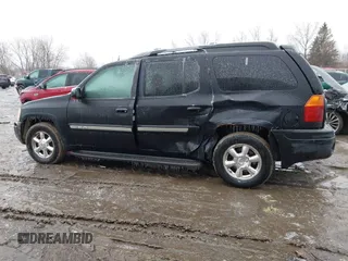 2005 GMC Envoy XL SLE with VIN 1GKET16S156160473, listed as a IAAI auction lot 41510661 with 233,942 mi miles. Bid and sale history available at carsss.com. Image 14.