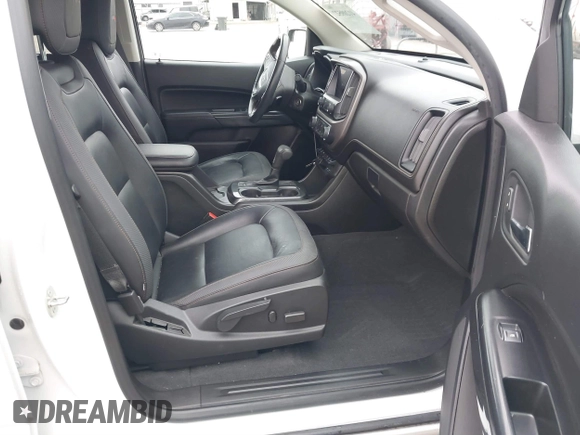 2021 GMC Canyon 4WD AT4 w/Leather with VIN 1GTG6FEN6M1154040, listed as a IAAI auction lot 41209527 with 29,484 mi miles. Bid and sale history available at carsss.com. Image 5.