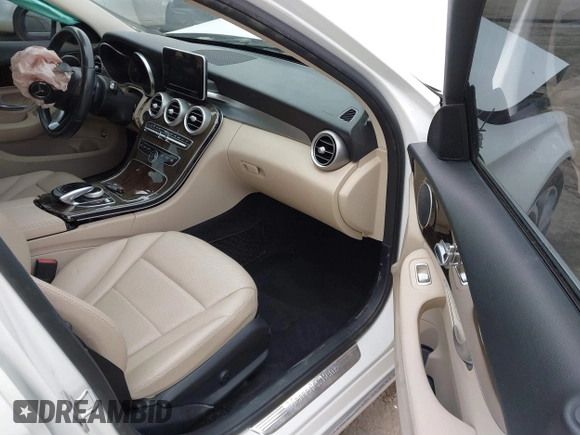 2016 Mercedes-Benz C 300 with VIN 55SWF4JB0GU124439, listed as a IAAI auction lot 40302446 with 71,304 mi miles and . Bid and sale history available at carsss.com. Image 5.
