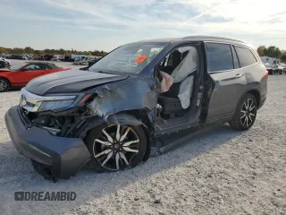 2021 Honda Pilot Touring 8-Passenger with VIN 5FNYF6H97MB047153, listed as a Copart auction lot 77392834 with Not provided miles and Salvage title. Bid and sale history available at DreamBid. Image 1.
