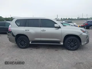 2021 Lexus GX 460 Premium z VIN JTJAM7BX2M5298598, wystawiony jako IAAI lot #41875695 z przebiegiem 48 822 mil mil oraz . Historia ofert i sprzedaży dostępna na DreamBid. Obrazek 13.