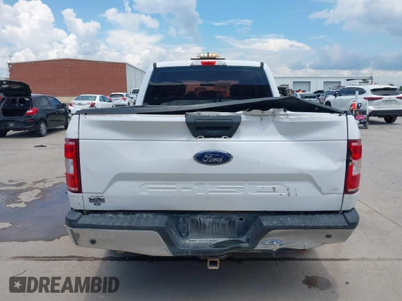 2018 Ford F-150 XL z VIN 1FTEX1CB3JKC44462, wystawiony jako IAAI lot #42597699 z przebiegiem 165 692 mil mil oraz . Historia ofert i sprzedaży dostępna na DreamBid. Obrazek 16.