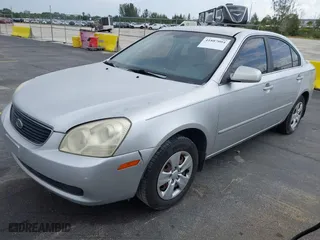 2007 Kia Optima LX with VIN KNAGE123175135348, listed as a IAAI auction lot 41887004 with 149,094 mi miles. Bid and sale history available at carsss.com. Image 6.