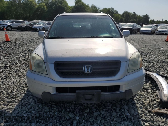 2005 Honda Pilot EX-L with VIN 2HKYF18505H500452, listed as a Copart auction lot 57552535 with 282,733 mi miles and Salvage title. Bid and sale history available at DreamBid. Image 5.