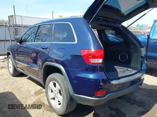 2013 Jeep Grand Cherokee Laredo with VIN 1C4RJEAG9DC621061, listed as a IAAI auction lot 41846537 with 107,264 mi miles. Bid and sale history available at carsss.com. Image 3.