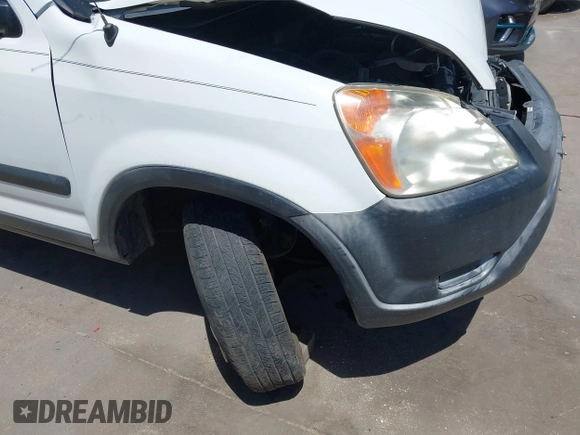 2003 Honda CR-V LX z VIN JHLRD68403C017375, wystawiony jako IAAI lot #42237124 z przebiegiem 172 054 mil mil oraz . Historia ofert i sprzedaży dostępna na DreamBid. Obrazek 21.