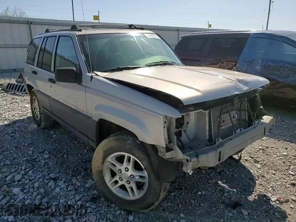 1997 Jeep Grand Cherokee Laredo with VIN 1J4GZ58S5VC561060, listed as a Copart auction lot 52098315 with 267,245 mi miles and Salvage title. Bid and sale history available at DreamBid. Image 12.