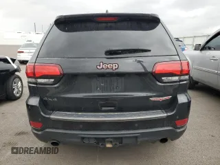 2017 Jeep Grand Cherokee Trailhawk with VIN 1C4RJFLT5HC692439, listed as a Copart auction lot 81093534 with 135,493 mi miles and Salvage title. Bid and sale history available at DreamBid. Image 6.