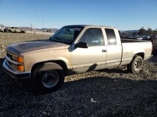 1998 Chevrolet Silverado 1500 with VIN 2GCEC19R9W1211909, listed as a Copart auction lot 88250705 with 302,783 mi miles and Salvage Title. Bid and sale history available at DreamBid. Image 1.