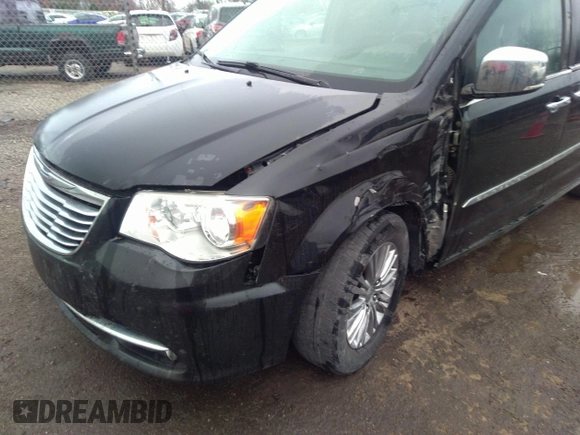 2015 Chrysler Town & Country Touring L with VIN 2C4RC1CG7FR539937, listed as a IAAI auction lot 41817807 with 158,400 mi miles and . Bid and sale history available at carsss.com. Image 6.