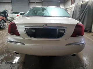 1998 Lincoln Continental with VIN 1LNFM97V9WY604317, listed as a Copart auction lot 83999234 with 91,277 mi miles and Salvage Title. Bid and sale history available at carsss.com. Image 6.
