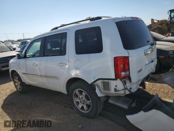 2010 Honda Pilot Touring with VIN 5FNYF3H82AB022596, listed as a Copart auction lot 71893214 with 131,901 mi miles and Salvage Title. Bid and sale history available at DreamBid. Image 2.