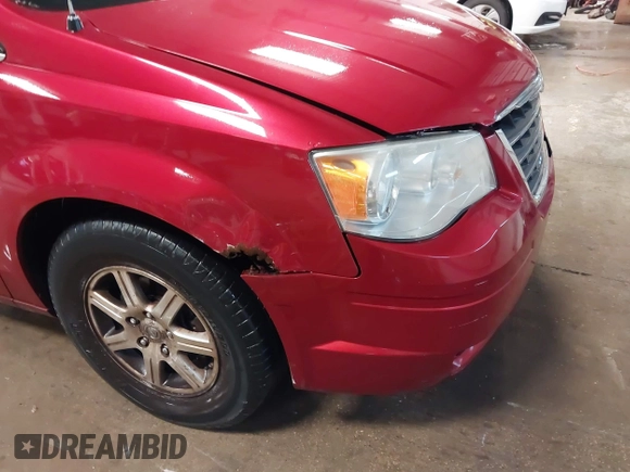 2008 Chrysler Town & Country Touring with VIN 2A8HR54P48R722319, listed as a IAAI auction lot 42262711 with 220,502 mi miles and . Bid and sale history available at DreamBid. Image 12.