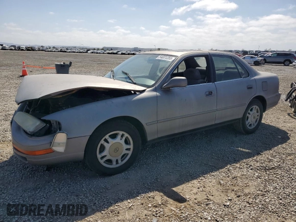 1994 Toyota Camry LE z VIN JT2GK12E6R0055565, wystawiony jako Copart lot #54031255 z przebiegiem 240 841 mil mil oraz Szkoda całkowita • Salvage title. Historia ofert i sprzedaży dostępna na DreamBid. Obrazek 1.