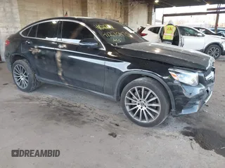 2019 Mercedes-Benz GLC 300 with VIN WDC0J4KB8KF516412, listed as a IAAI auction lot 41270475 with 129,744 mi miles and . Bid and sale history available at DreamBid. Image 1.