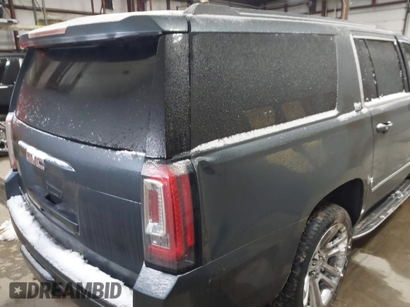 2019 GMC Yukon XL SLT with VIN 1GKS2GKC5KR137005, listed as a IAAI auction lot 41435370 with 125,453 mi miles and . Bid and sale history available at carsss.com. Image 4.
