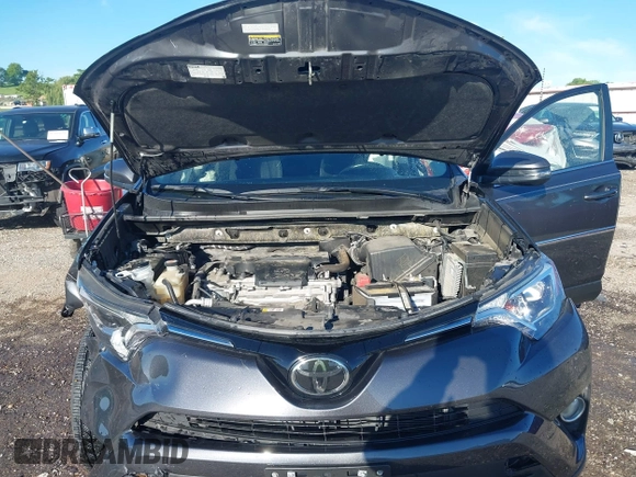 2018 Toyota RAV4 XLE z VIN JTMWFREV1JJ197662, wystawiony jako IAAI lot #42167382 z przebiegiem 64 826 mil mil oraz . Historia ofert i sprzedaży dostępna na DreamBid. Obrazek 10.