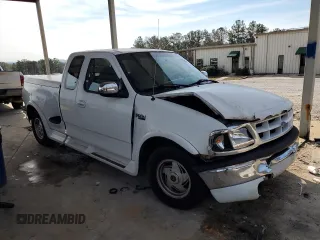 1997 Ford F-150 z VIN 1FTDX0766VKA86983, wystawiony jako Copart lot #50896215 z przebiegiem 214 746 mil mil oraz Szkoda całkowita • Salvage title. Historia ofert i sprzedaży dostępna na DreamBid. Obrazek 4.