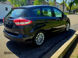 2018 Ford C-Max SE z VIN 1FADP5AU4JL102628, wystawiony jako Copart lot #59427625 z przebiegiem 55 666 mil mil oraz Szkody całkowita. Historia ofert i sprzedaży dostępna na DreamBid. Obrazek 4.