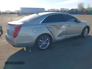 2014 Cadillac XTS Luxury z VIN 2G61N5S3XE9298471, wystawiony jako IAAI lot #41069292 z przebiegiem 92 112 mil mil oraz . Historia ofert i sprzedaży dostępna na DreamBid. Obrazek 4.