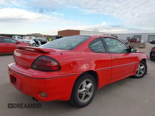 2004 Pontiac Grand Am z VIN 1G2NV12EX4M641018, wystawiony jako IAAI lot #41255352 z przebiegiem 144 385 mil mil oraz . Historia ofert i sprzedaży dostępna na DreamBid. Obrazek 4.
