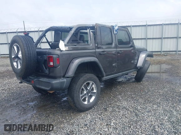 2019 Jeep Wrangler Unlimited Sahara with VIN 1C4HJXEG8KW627530, listed as a IAAI auction lot 42122544 with 118,064 mi miles and . Bid and sale history available at DreamBid. Image 4.