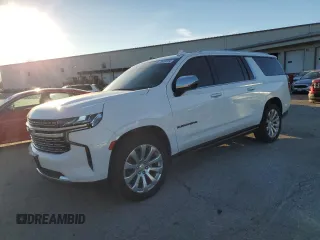 2022 Chevrolet Suburban Premier with VIN 1GNSKFKT7NR242288, listed as a Copart auction lot 79420734 with 77,006 mi miles and Salvage Title. Bid and sale history available at DreamBid. Image 1.