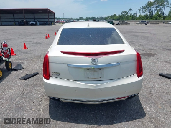 2013 Cadillac XTS Luxury with VIN 2G61P5S38D9160016, listed as a IAAI auction lot 42192602 with 134,879 mi miles and . Bid and sale history available at DreamBid. Image 16.