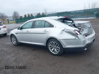2014 Ford Taurus Limited with VIN 1FAHP2F81EG123933, listed as a IAAI auction lot 41843301 with 111,629 mi miles. Bid and sale history available at carsss.com. Image 14.