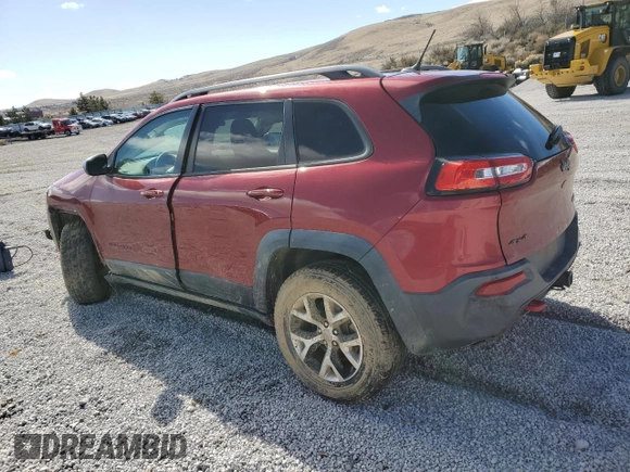 2014 Jeep Cherokee Trailhawk with VIN 1C4PJMBS7EW157305, listed as a Copart auction lot 49436685 with 138,446 mi miles and Salvage Title. Bid and sale history available at carsss.com. Image 2.