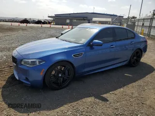 2016 BMW M5 with VIN WBSFV9C56GD595598, listed as a Copart auction lot 53042714 with 87,563 mi miles. Bid and sale history available at carsss.com. Image 1.