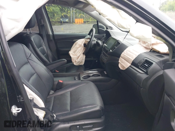 2021 Honda Ridgeline RTL-E with VIN 5FPYK3F75MB015370, listed as a IAAI auction lot 42253586 with 84,188 mi miles and . Bid and sale history available at DreamBid. Image 5.