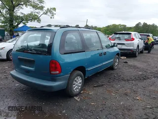 1998 Plymouth Voyager z VIN 2P4GP25R9WR797419, wystawiony jako IAAI lot #42324881 z przebiegiem 96 543 mil mil oraz . Historia ofert i sprzedaży dostępna na DreamBid. Obrazek 4.