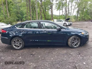2020 Ford Fusion SEL with VIN 3FA6P0CD1LR180409, listed as a IAAI auction lot 42384311 with 39,163 mi miles and . Bid and sale history available at DreamBid. Image 13.
