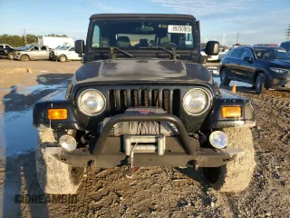 2004 Jeep Wrangler Rubicon with VIN 1J4FA69S44P763015, listed as a Copart auction lot 89250905 with 111,528 mi miles and Salvage Title. Bid and sale history available at carsss.com. Image 5.