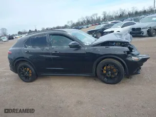 2018 Alfa Romeo Stelvio Ti Sport with VIN ZASFAKNN5J7B99778, listed as a IAAI auction lot 41257878 with 92,495 mi miles. Bid and sale history available at carsss.com. Image 13.
