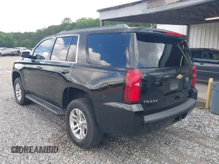 2015 Chevrolet Tahoe LS z VIN 1GNSCAKC5FR101933, wystawiony jako IAAI lot #42242415 z przebiegiem 185 191 mil mil oraz . Historia ofert i sprzedaży dostępna na DreamBid. Obrazek 3.