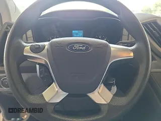 2018 Ford Transit z VIN 1FTYE1CM3JKB42289, wystawiony jako IAAI lot #42717396 z przebiegiem 88 406 mil mil oraz . Historia ofert i sprzedaży dostępna na DreamBid. Obrazek 5.