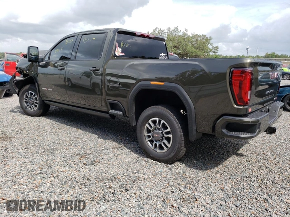 2023 GMC Sierra 3500HD AT4 z VIN 1GT49VEY3PF127108, wystawiony jako Copart lot #57052823 z przebiegiem 9915 mil mil oraz Szkody całkowita. Historia ofert i sprzedaży dostępna na DreamBid. Obrazek 2.
