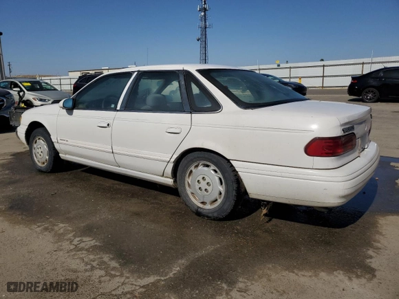 1994 Ford Taurus GL with VIN 1FALP52U7RG261559, listed as a Copart auction lot 55681304 with 28,675 mi miles and Salvage Title. Bid and sale history available at carsss.com. Image 2.
