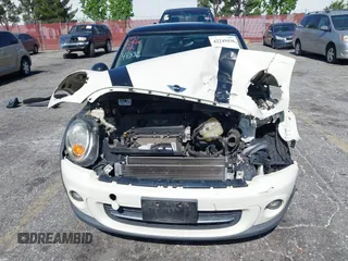 2011 MINI Hardtop with VIN WMWSU3C52BT095133, listed as a IAAI auction lot 42249436 with 44,652 mi miles and . Bid and sale history available at DreamBid. Image 6.