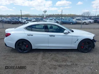 2021 Genesis G70 3.3T with VIN KMTG34LEXMU076278, listed as a IAAI auction lot 41976406 with 44,684 mi miles and . Bid and sale history available at DreamBid. Image 14.