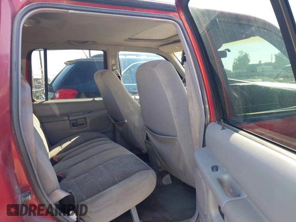 1999 Ford Explorer XLT with VIN 1FMZU35PXXZA67080, listed as a IAAI auction lot 42228465 with 212,488 mi miles and . Bid and sale history available at DreamBid. Image 8.