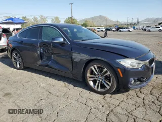 2016 BMW 4 Series 428i z VIN WBA4A9C59GG696298, wystawiony jako Copart lot #52348325 z przebiegiem 87 319 mil mil oraz Szkoda całkowita • Salvage title. Historia ofert i sprzedaży dostępna na DreamBid. Obrazek 4.