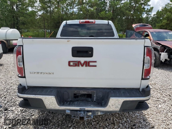 2015 GMC Canyon with VIN 1GTH51EA9F1263487, listed as a Copart auction lot 64905974 with 123,596 mi miles and Clean title. Bid and sale history available at DreamBid. Image 6.