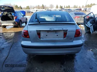 2006 Hyundai Elantra GLS z VIN KMHDN56D96U189271, wystawiony jako Copart lot #46472245 z przebiegiem 139 094 mil mil oraz Szkoda całkowita • Salvage title. Historia ofert i sprzedaży dostępna na DreamBid. Obrazek 6.
