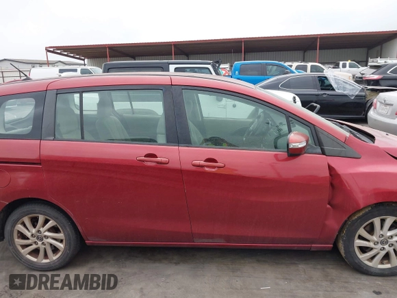 2013 Mazda 5 Sport z VIN JM1CW2BL7D0151003, wystawiony jako IAAI lot #41953272 z przebiegiem 106 624 mil mil oraz . Historia ofert i sprzedaży dostępna na DreamBid. Obrazek 13.
